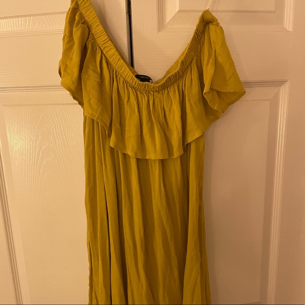 Mustard off the shoulder dress.